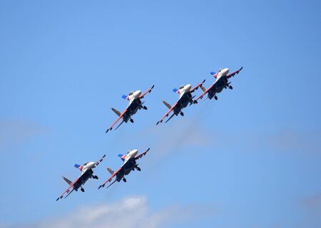 MOSCOW REGION - AUGUST 30: Demonstrative performance of the aerobatic team of Russian military aircrafts at the airshow on August 30, 2015 in Moscow regionのeditorial素材