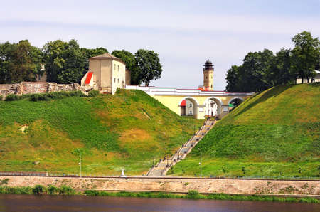 Remains of the ancient fortress, old time bridge and the staircase on the top of the hill by the riverのeditorial素材