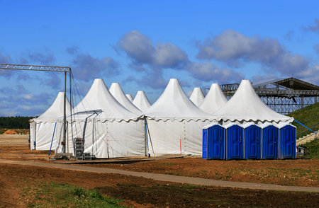 White awnings and other items of equipment for arrangement of exhibitionの写真素材