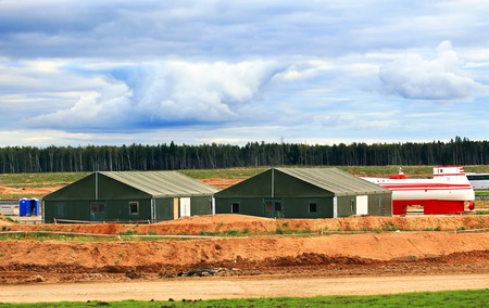 Two big tents on a large-scale construction siteの写真素材
