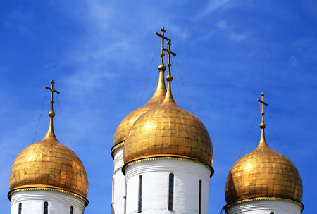 Golden onion domes  of the fifteenth century orthodox temple in Moscow  Kremlinの写真素材