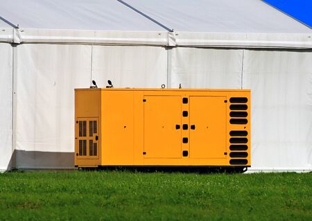 Yellow full container for a diesel power plant (diesel generator)の写真素材
