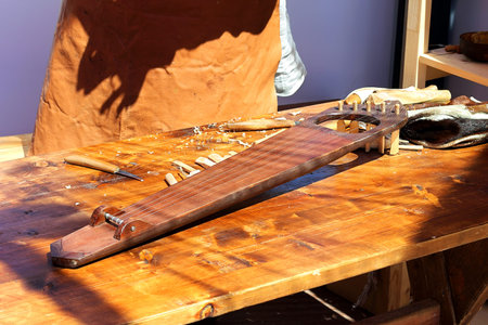 In the workshop for the manufacture of stringed musical instruments - the table of the master