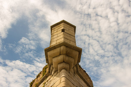 building detail with cloudy blue skyの写真素材