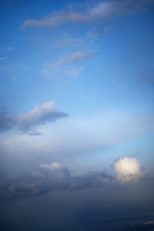 Blue sky with white fluffy clouds
