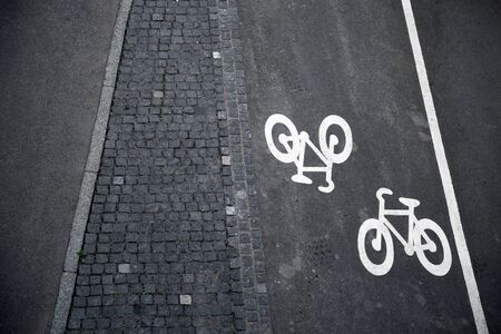 Bicycle signs painted on asphaltの写真素材