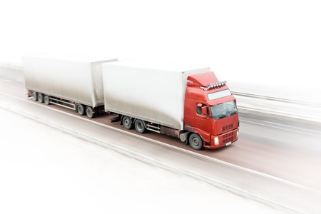 red truck on highway partly isolated on whiteの写真素材