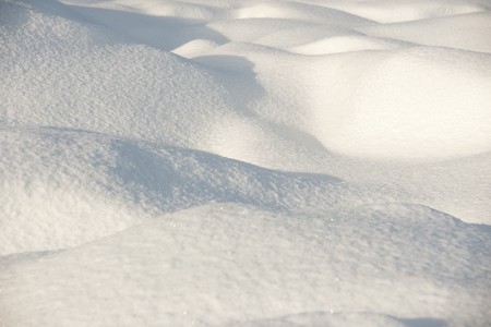 Snow surface in evening lightの写真素材