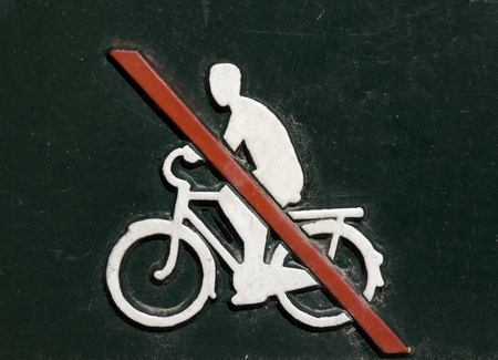 No cycling sign made of metal. This is a public sign in a park in Stockholm, Sweden.の写真素材