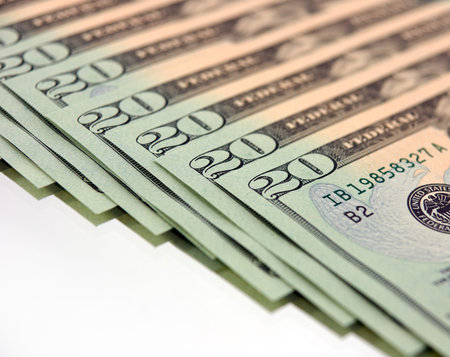 row of twenty dollar bills