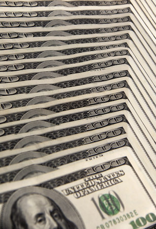 Close of stack of hundred dollar bills