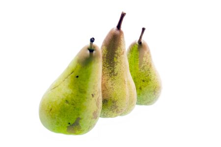 Three pears ina row isolated on whiteの写真素材