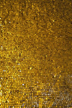 wall with golden mosaicの写真素材