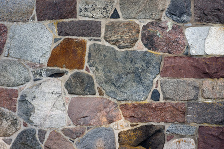 Wall of naural granite rock in different colorsの写真素材
