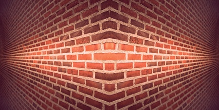 Red brick wall with diminishing perspectiveの写真素材