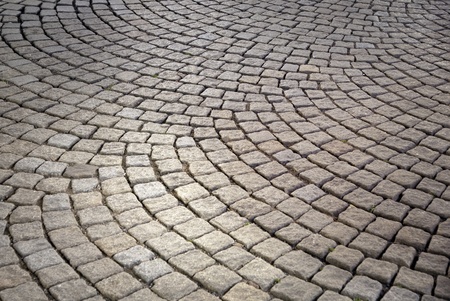 Background of  street with cobblestone in circular patternの写真素材