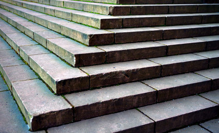 Old stone staircase with moss between the steps
