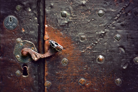 Cloe up of ancient copper door with copper handleの写真素材