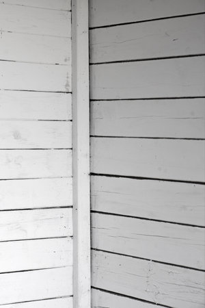 background with white weathered wooden wallの写真素材