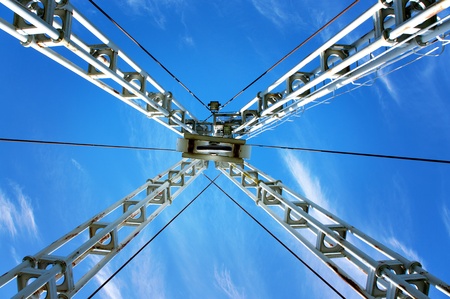 Low angle view of crane on blue skyの写真素材