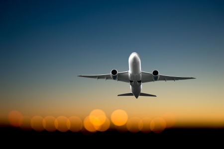 Low angle view of jet  airliner taking offの写真素材