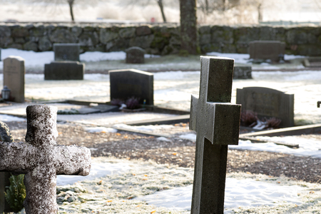 church yard with tombstones on a sunny winter dayのeditorial素材