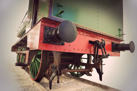 rear view of colorful vintage locomotive in shades of sepia