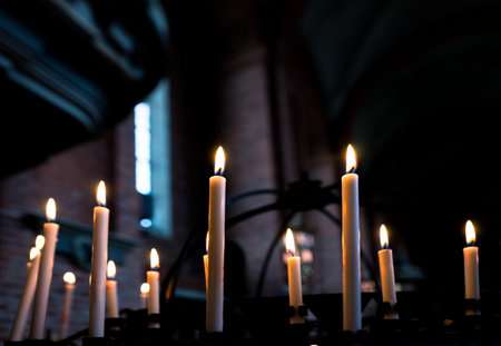 Peaceful candles in Christian churchの写真素材