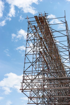 low angle view of scaffolding on blue sky