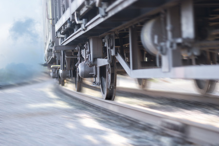 close up of wheels of train in blurred motionの写真素材