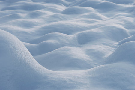 Background with smooth bumpy snow surfaceの写真素材