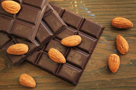 Top view of dark chocolate and almondの写真素材