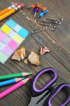 School materials display on a wooden table