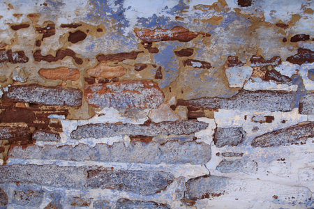 Texture of blue and red brick forming a wall