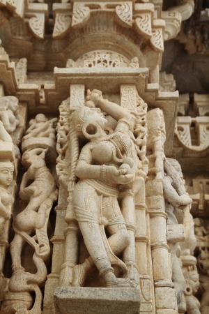 Detail of a woman with earrings on a pillar in Chaumukha Mandir, the main jain temple at Ranakpur, India   More than 80 domes and 1444 white marble pillars all differents のeditorial素材