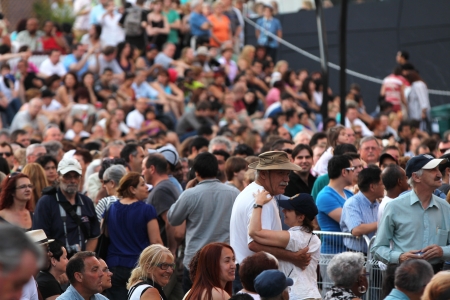 MONTREAL - JUNE 29: People walk and danse during the open-air concert at the 33th International Jazz Festival of Montreal on June 29, 2012 in Montreal, Canada のeditorial素材