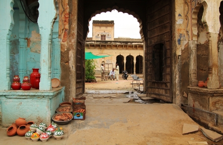 MANDAWA - SEPT 14, 2012: Salesmen discussing about the government passed reforms that cut certain subsidies and give place to Wal Mart on sept 14, 2012 in MANDAWA, Indiaのeditorial素材