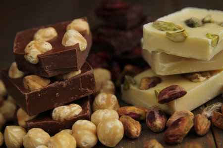 Chocolate milk with hazelnut and white chocolate with pistachios