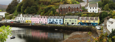 Biggest village on skye island, Portree with his colorful house near the Loch Portree, Scotland, UK.のeditorial素材