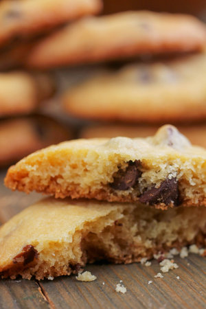Close up of chocolate chips cookies on a wooden tableの写真素材