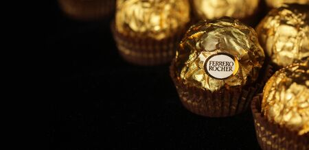MONTREAL, CANADA - FEBRUARY 05, 2015: Ferrero Rocher chocolate is a sweet made by Italian Ferrero Spa. Rock comes from French and means clustering \ "rock \" after a grotto in the Roman Catholic shrine of Lourdes.のeditorial素材
