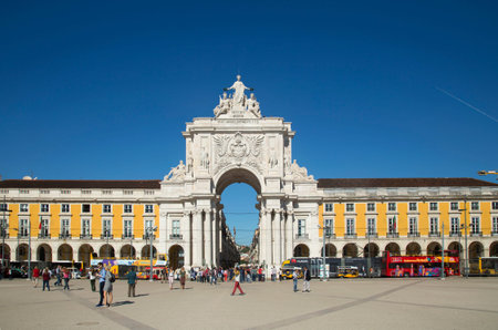 LISBON-PORTUGAL NOVEMBER 06, 2015:  View of the arch with a yellow tramway at The Praa do...
