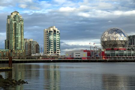 Beautiful view of Vancouver, Canada with apartment towers, the marina, and the science museumのeditorial素材