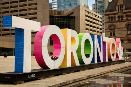 Colourful Toronto sign at Nathan Phillips square in Toronto, Canada.  The Square is used regularly for art exhibits, concerts, rallies and other ceremonies.のeditorial素材