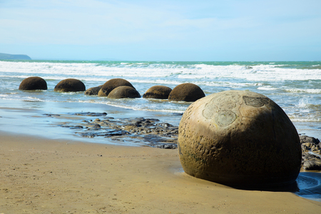 Spheric Moeraki boulders at Koekohe beach in South Island, New Zealand.の写真素材