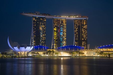 SINGAPORE - October 29, 2019: Marina bay sands is a luxury hotel and have three hotel towers, which has 2,500 rooms and suites and a infiniti pool on 57th floors.のeditorial素材