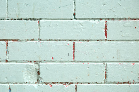 Mat brick wall paint in pastel green の写真素材