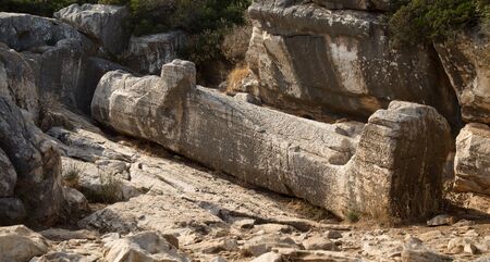 Half finished statue know as kouros of the god apollo,  lying in supine position and dates to the 6th century in Naxos island in Greeceの写真素材