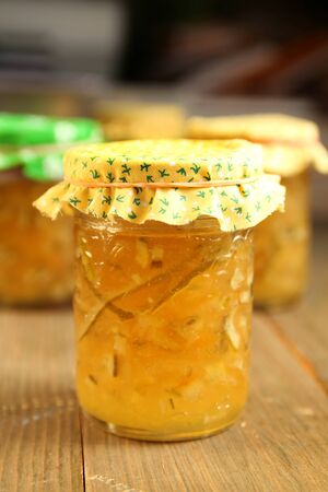Citrus homemade marmalade with yellow material on topの写真素材