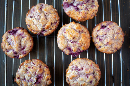 Warm and fresh handmade strawberry muffins on a grillの写真素材